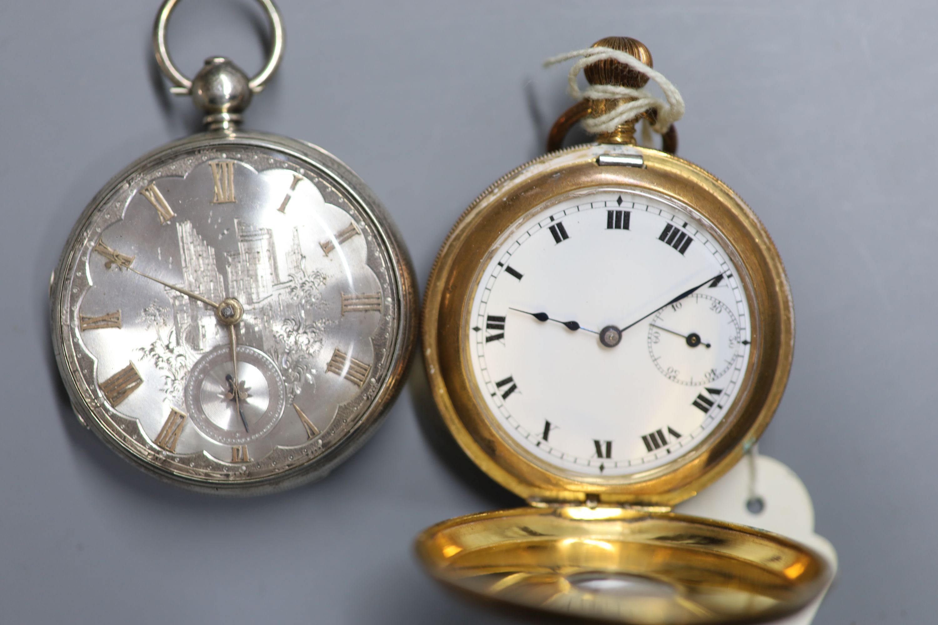 An engine turned gold plated half hunter keyless pocket watch and a 19th century silver pocket watch